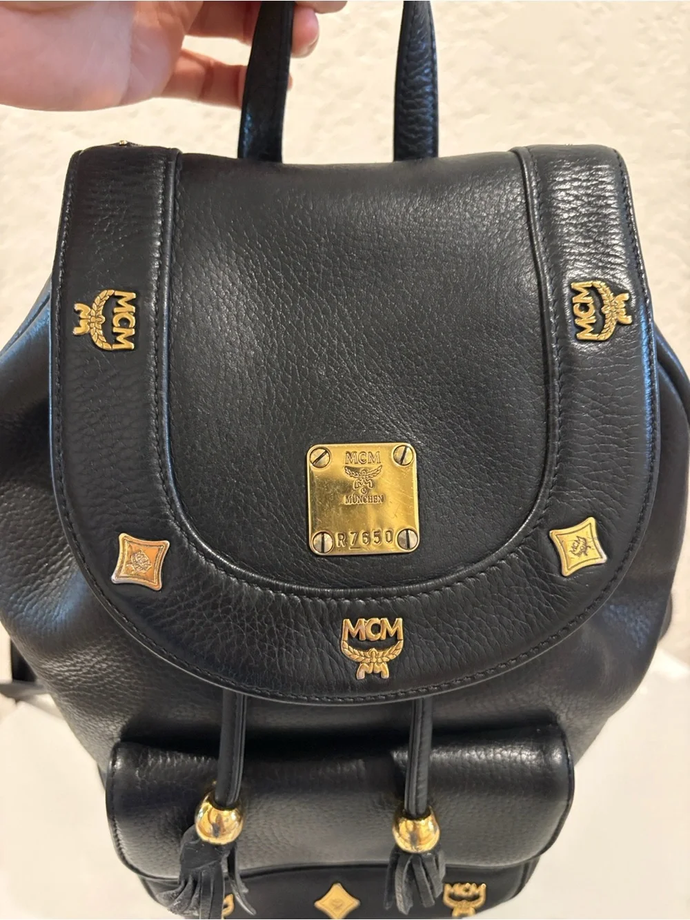 MCM Black Leather Drawstring Backpack with Gold Hardware